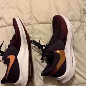 Nike Running Shoes in Burgundy and Black with Gold Accent